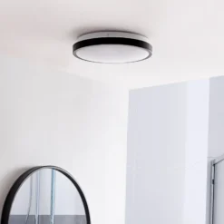 Lindby LED-Deckenlampe Medon Ø 29 cm schwarz Kunststoff IP44
