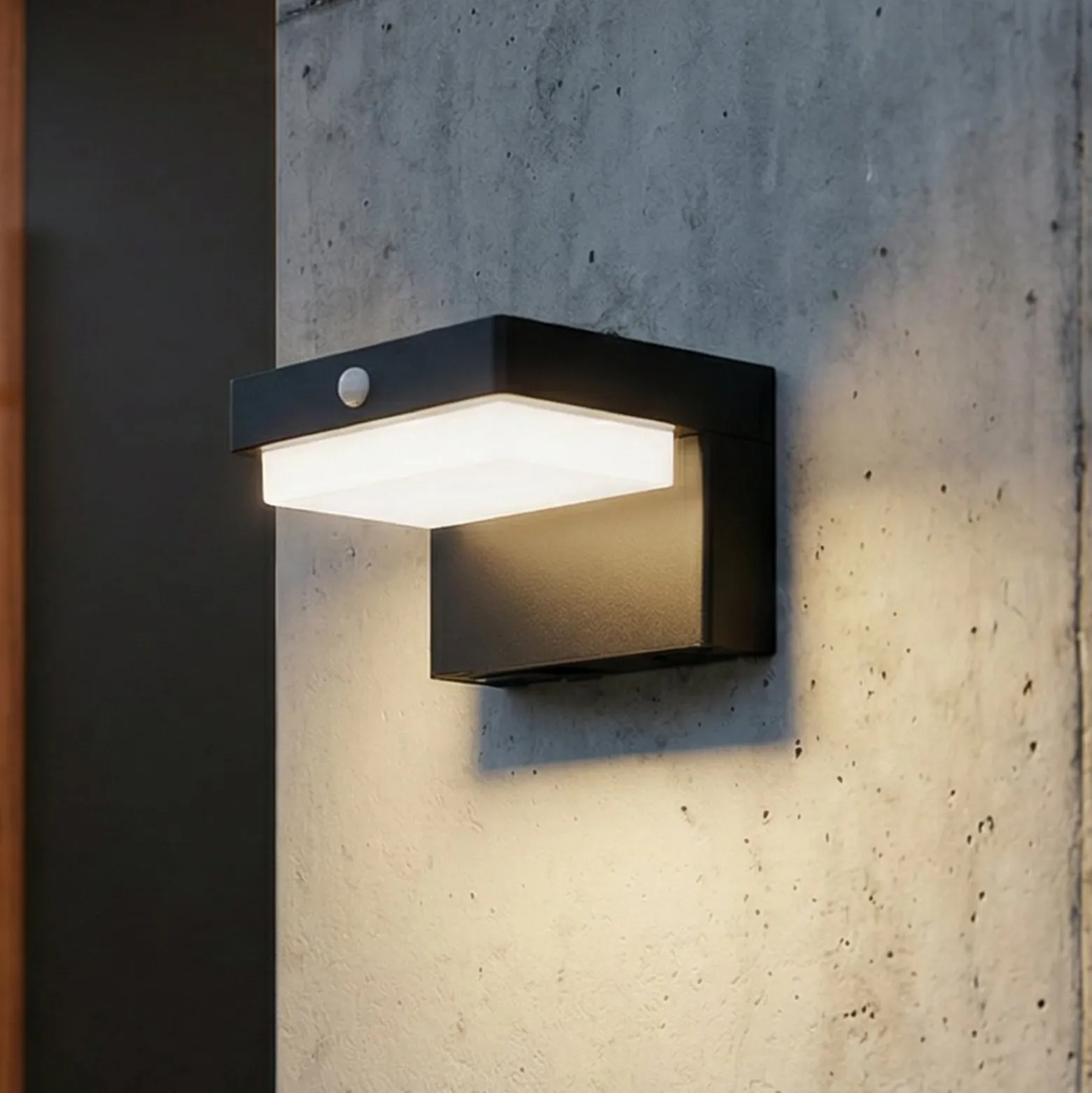 Lindby LED-Solarwandlampe Eleazar, schwarz, Sensor