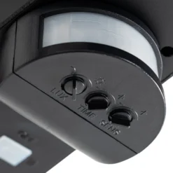 Lindby LED-Solarwandleuchte Naelin, schwarz, Sensor, IP44