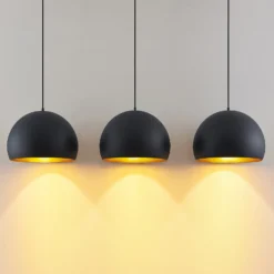Lindby Pendellampe Tarjei, 146 cm lang, schwarz/gold, Metall