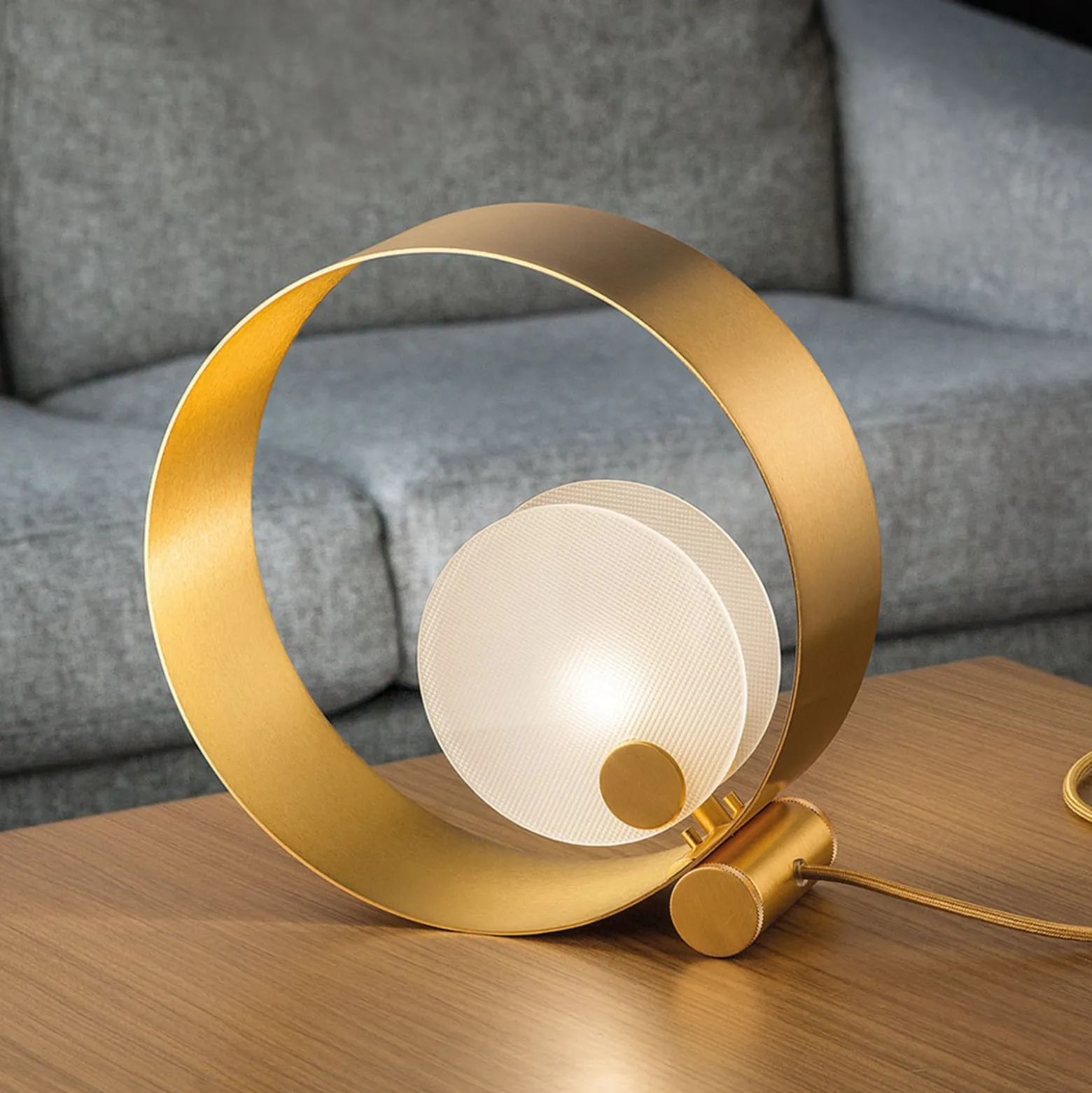 Tischleuchte Sound TL1, rund, goldener Rahmen, G9